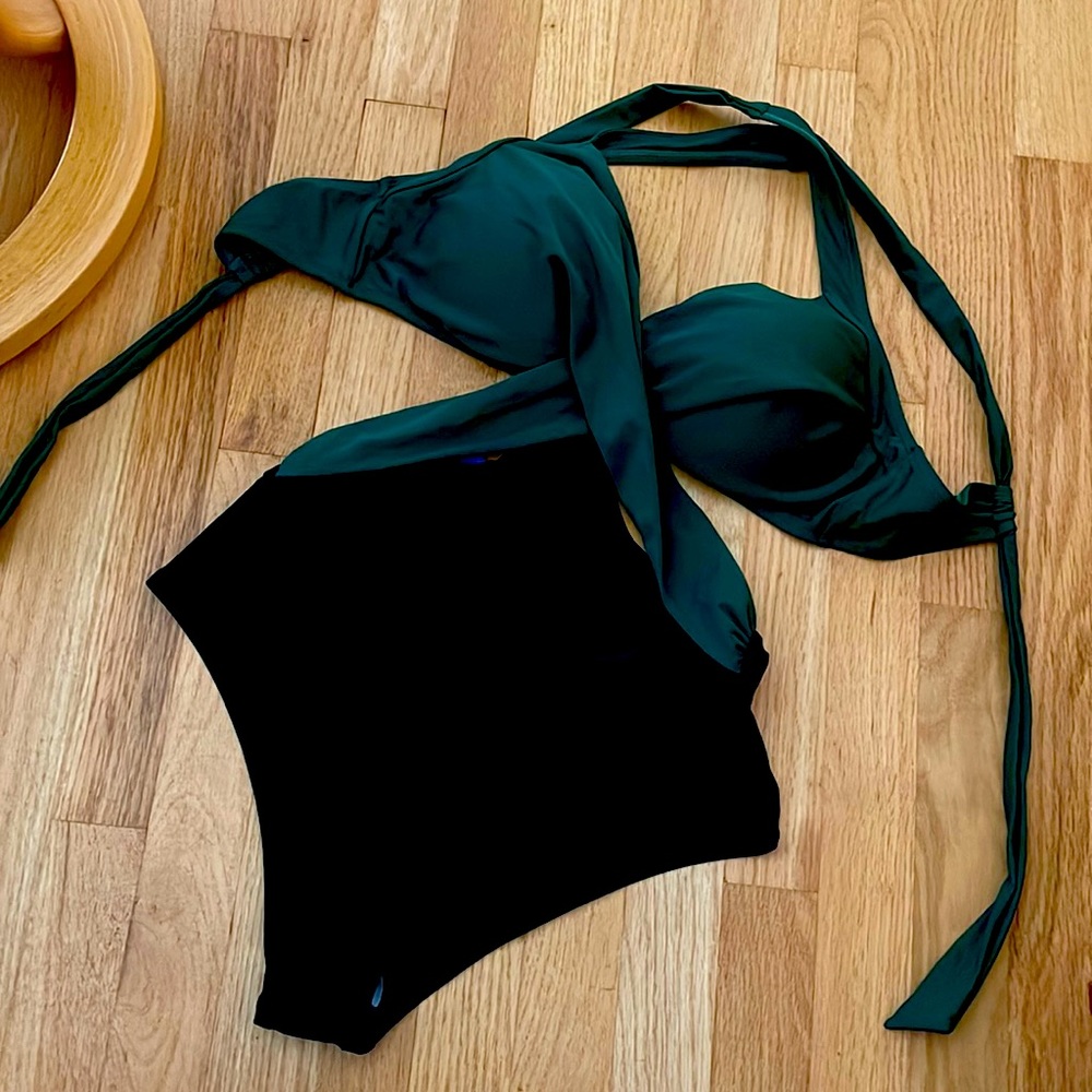 Brand new with tags. One piece cross back swimsuit